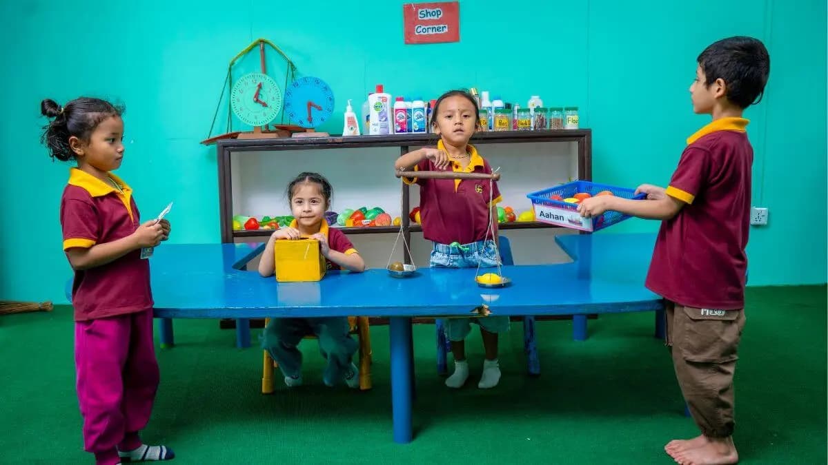 Children counting at a group table